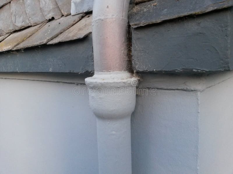 Downpipe at a house stock photo. Image of grey, slate 115880958