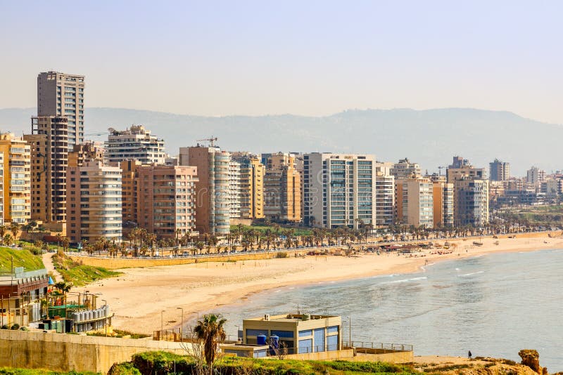 Downtown Buildings and Towers with Road, Sandy Beach and Sea in the ...