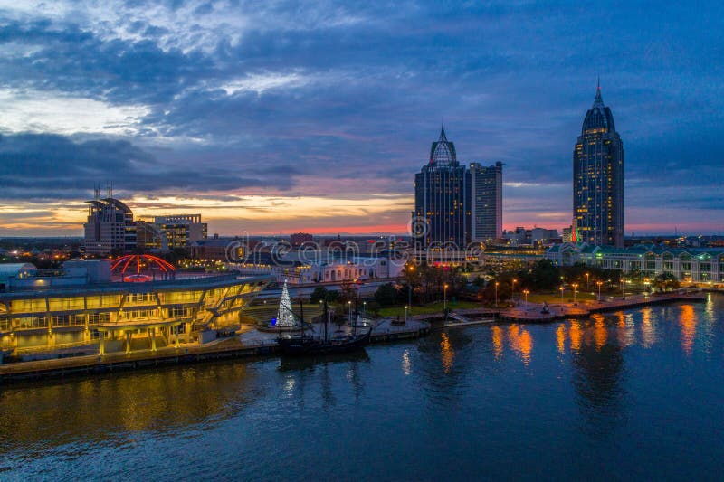 Downtown Mobile, Alabama Waterfront Skyline at Sunset Stock Photo