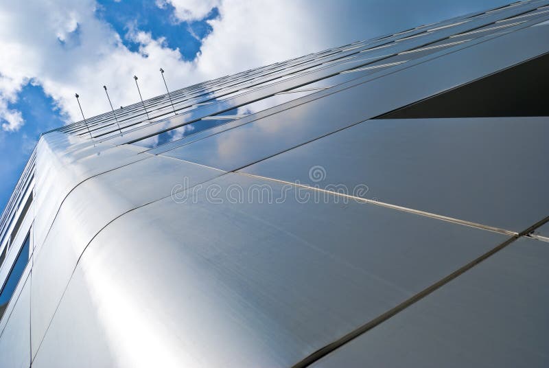 Downtown Office building reflecting blue sky