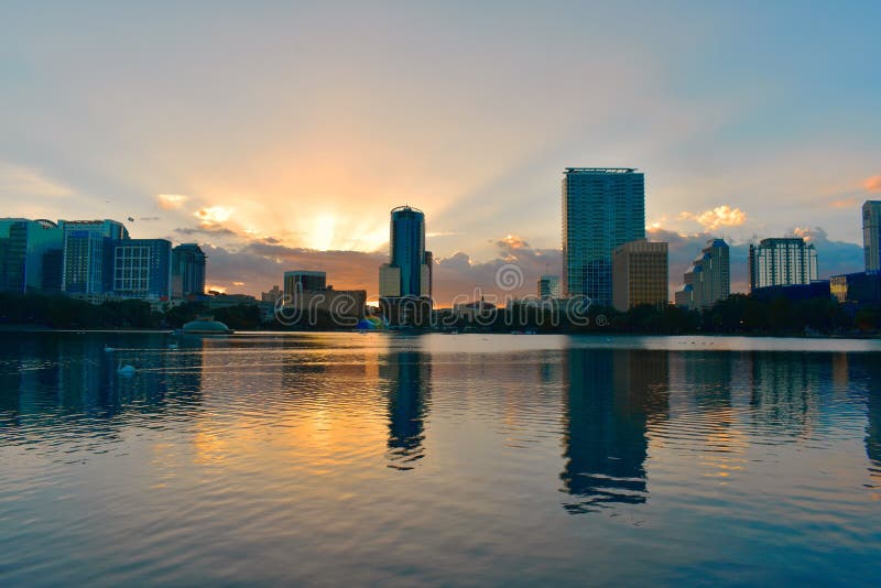 Downtown Orlando buildings in front of Eola Lake Park on beatiful sunset. stock image Downtown Orlando buildings in front of Eola Lake Park on beatiful sunset. stock image