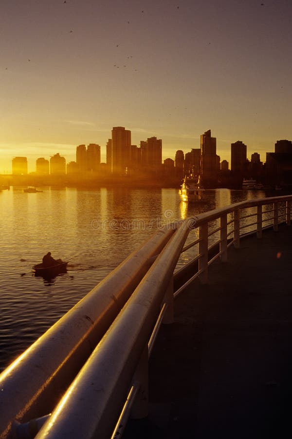 Skyscrapers of downtown silhouetted at sunset- Vancouver (British Columbia), Canada. Vancouver skyscraper stock images, royalty-free photos and pictures