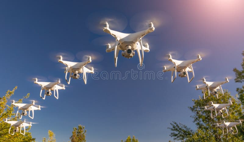 Dozens of Drones Swarm in the Clear Sky