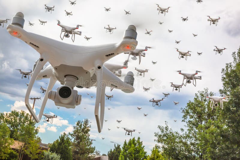 Dozens of Drones Swarm in the Cloudy Sky