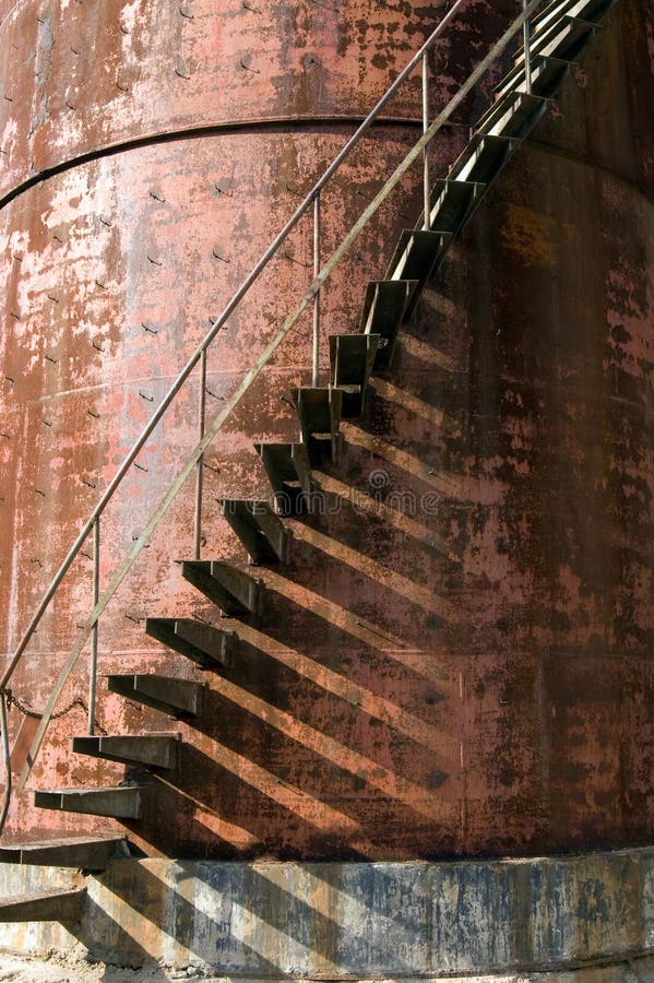 Detail of a ladder in a rusty pillar. Detail of a ladder in a rusty pillar