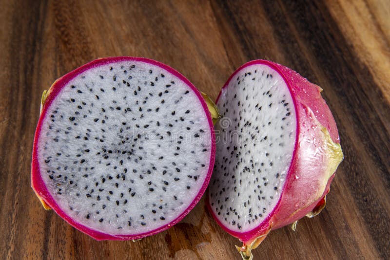 Dragon fruit cut in half stock photo. Image of chopped 190174666