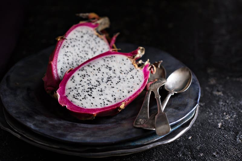Dragon Fruit Cut Open On A Plate Stock Photo Image of dragonfruit