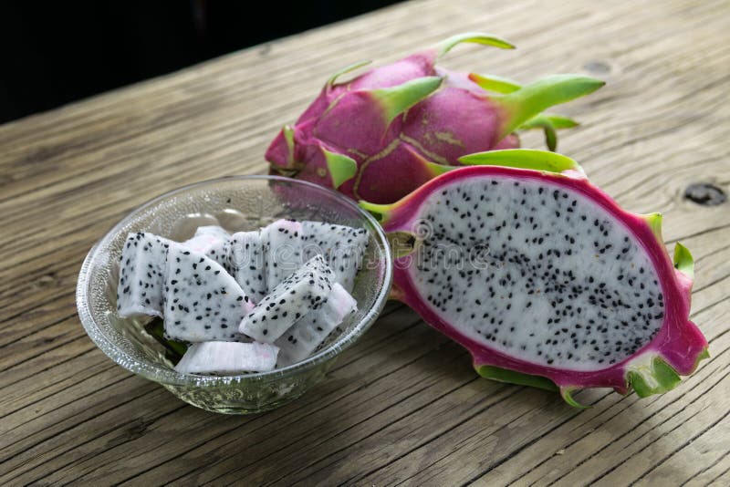 Dragon Fruit On old Wooden Table royalty free stock photo
