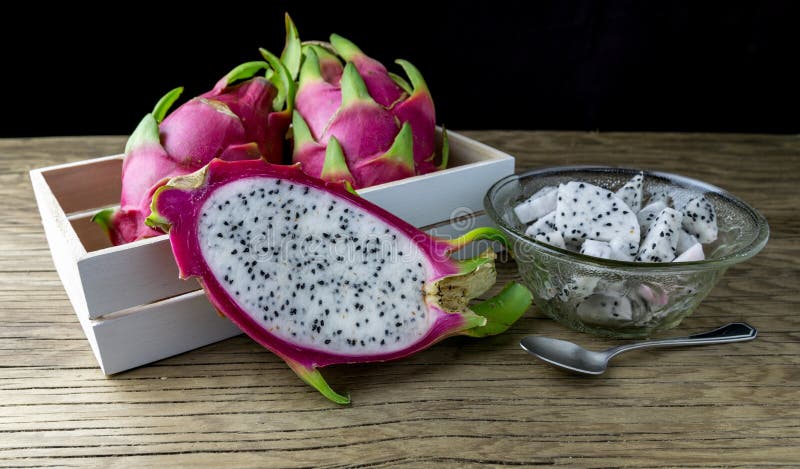 Dragon Fruit On old Wooden Table royalty free stock photography