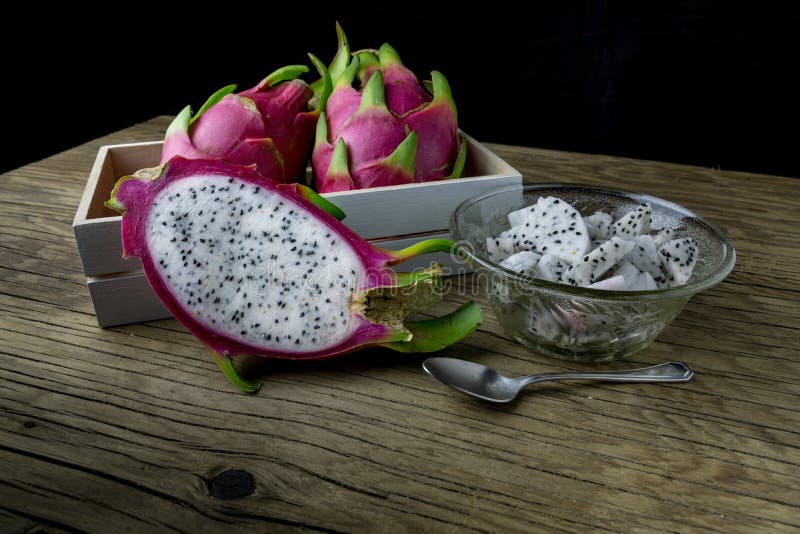 Dragon Fruit On old Wooden Table royalty free stock photos