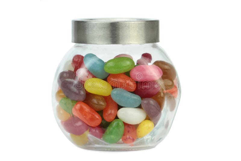 Dragées à la gelée de sucre colorées dans le pot d'isolement sur le fond blanc photographie stock Dragées à la gelée de sucre colorées dans le pot d'isolement sur le fond blanc photographie stock