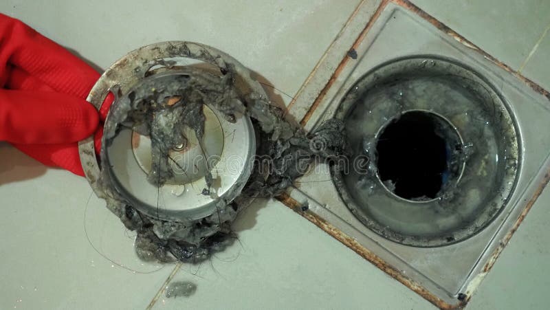 Drain cleaning. Clogged and dirty sewer pipes floor drain