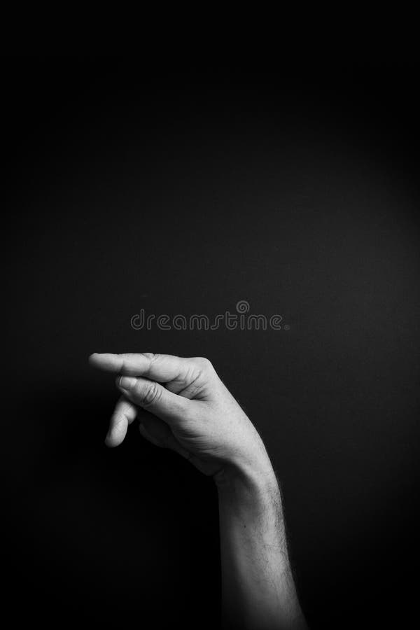 B&W image of hand demonstrating ASL sign language letter P with empty copy space stock photo