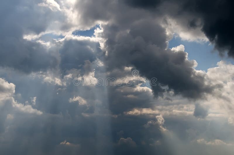 Dramatic clouds with sun rays