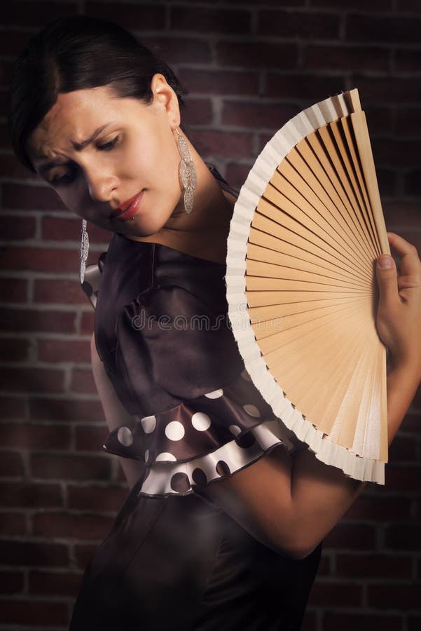 Dramatic Flamenco dance with hand fan