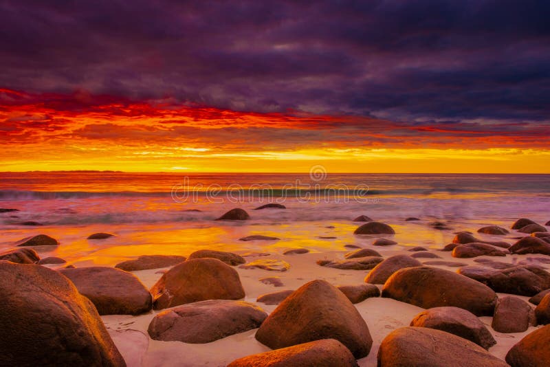 Dramatic Midnight Sunset With Amazing Colors Over Uttakleiv Beach On