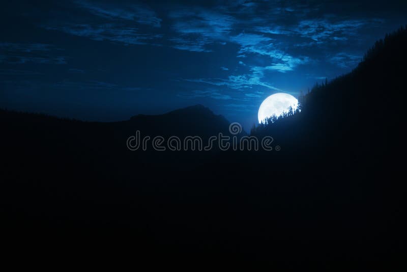 Dramatic Nighttime Moonrise Over Mountain Ridge and Pine Trees stock photos Dramatic Nighttime Moonrise Over Mountain Ridge and Pine Trees stock photos