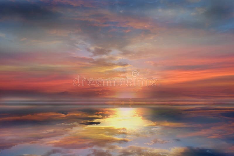 Dramatic pink  red gold sunset  yellow  blue cloudy   dramatic  blue stormy sky sun down reflection on sea water nature background