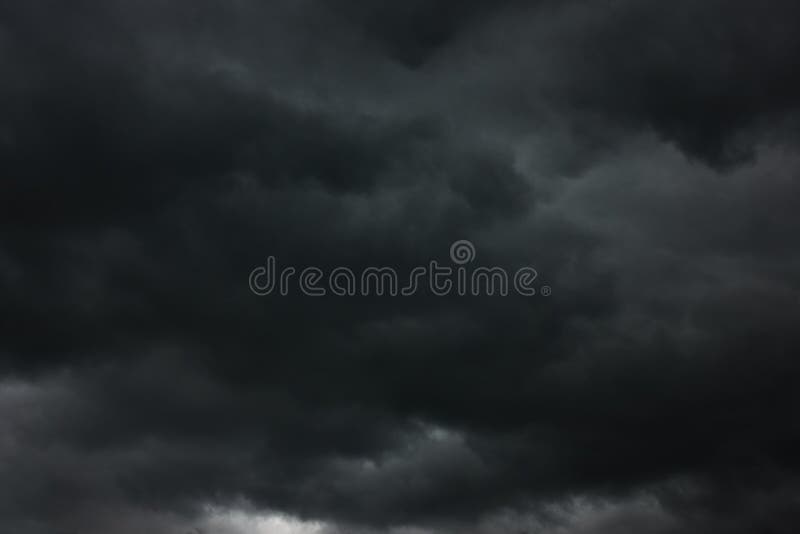 Dramatic sky with black heavy clouds royalty free stock photography