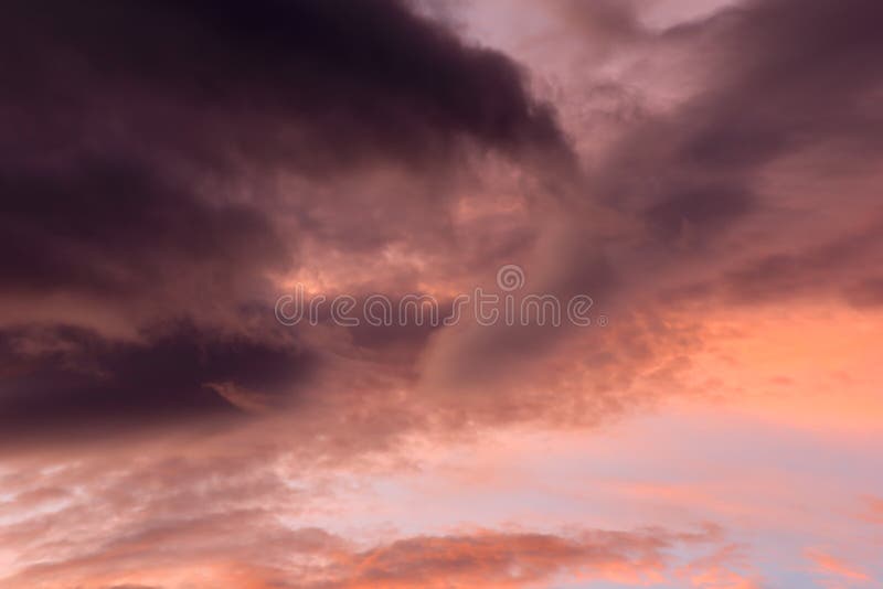 Dramatic Sunset Sky with Orange Colored Clouds Soft Focus Stock Image