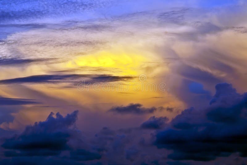 Dramatic Textures of Light. The setting sun creates dramatic colors across the textures skies stock images