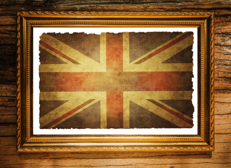 Union jack flag in Picture frame on the wooden wall. Union jack flag in Picture frame on the wooden wall