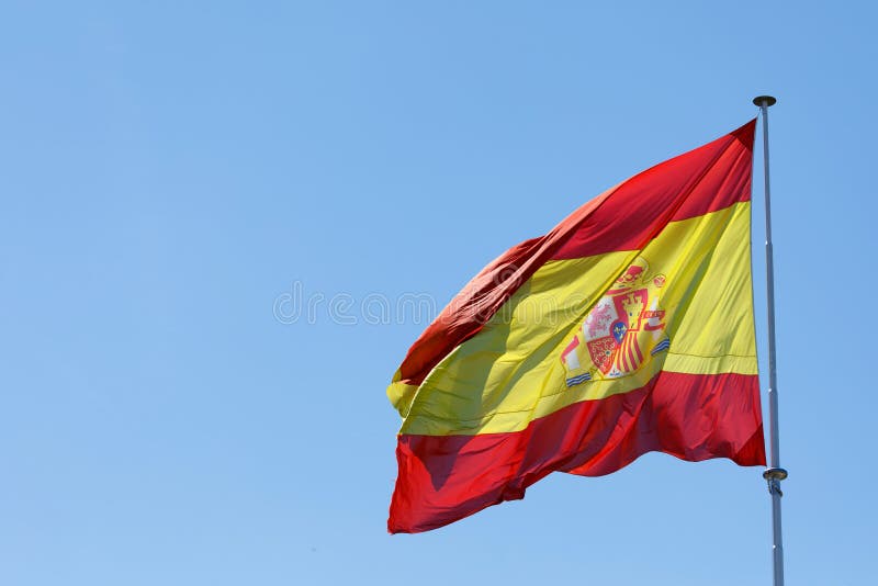 Drapeau de l'Espagne ondulant dans le vent photo stock Drapeau de l'Espagne ondulant dans le vent photo stock