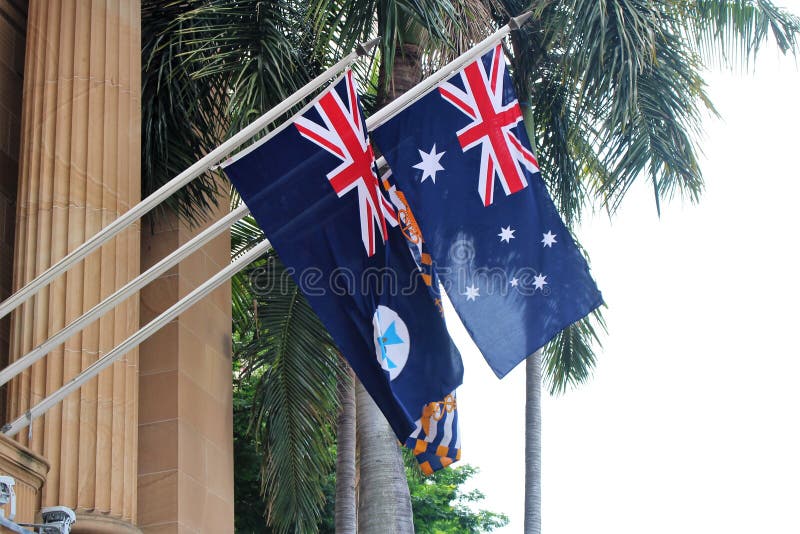 Queensland and Australia flag on a house wall in central Brisbane. Queensland and Australia flag on a house wall in central Brisbane.