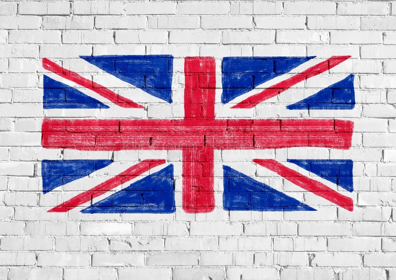 National flag of the United Kingdom UK aka Union Jack painted on white bricks wall. National flag of the United Kingdom UK aka Union Jack painted on white bricks wall