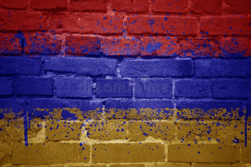 Colorful painted national flag of armenia on a old brick wall. Colorful painted national flag of armenia on a old brick wall