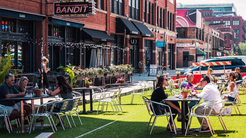 West Loop, Chicago-July 16, 2020: Outdoor dining helps restaurants comply with social distancing mandates. West Loop, Chicago-July 16, 2020: Outdoor dining helps restaurants comply with social distancing mandates