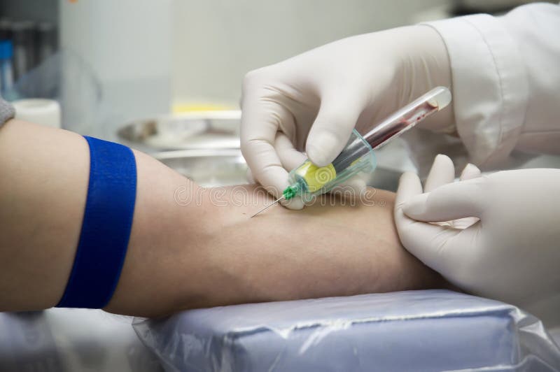 Drawing blood from patient stock photo. Image of illness 15429110