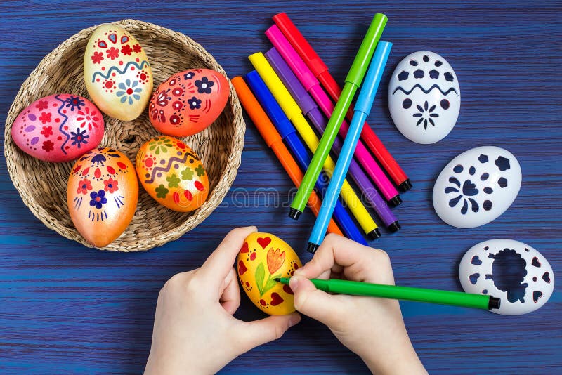Drawing on Easter Eggs with Using Stencils. Step 4 Stock Photo Image