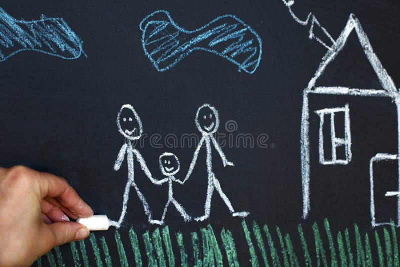 Drawing happy homosexual parents with a child on a chalk board. Gay family concept