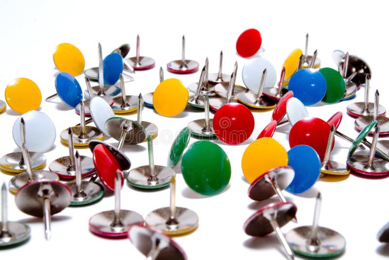 Drawing pins thumb tacks in many colors isolated