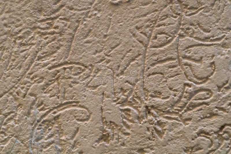 Drawings made by hand, using different-sized pebbles to imitate traces of beetles moving on wood and eating tree bark. Interior royalty free stock photos