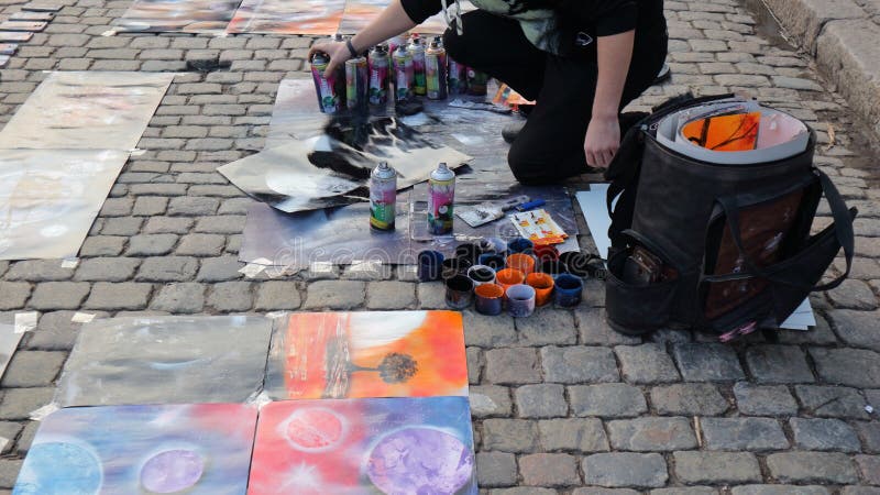 Drawings by a street artist who paints with cans of paint and fire right outside in the open air. Drawings by a street artist who paints with cans of paint and fire right outside in the open air.