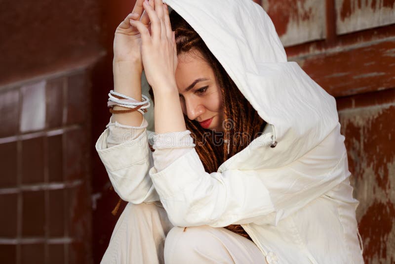 Dreadlocks fashionable girl portrait, dressed in white stock images Dreadlocks fashionable girl portrait, dressed in white stock images