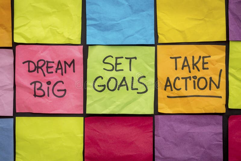 Dream big, set goals, take action on sticky notes