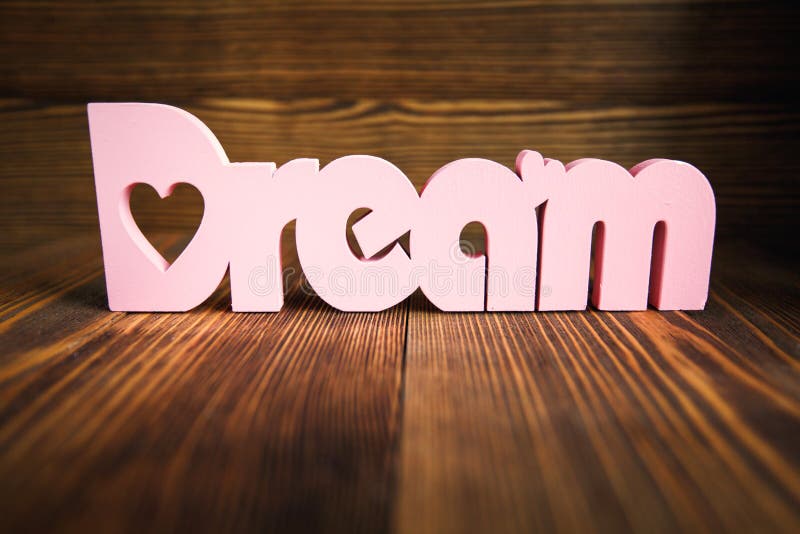 Dream Letters On Wooden Background. Stock Image - Image of motivation