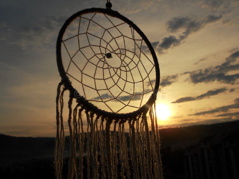 Dreamcatcher in de hemel, Dromen, Zonsonderganglicht royalty-vrije stock fotografie Dreamcatcher in de hemel, Dromen, Zonsonderganglicht royalty-vrije stock fotografie