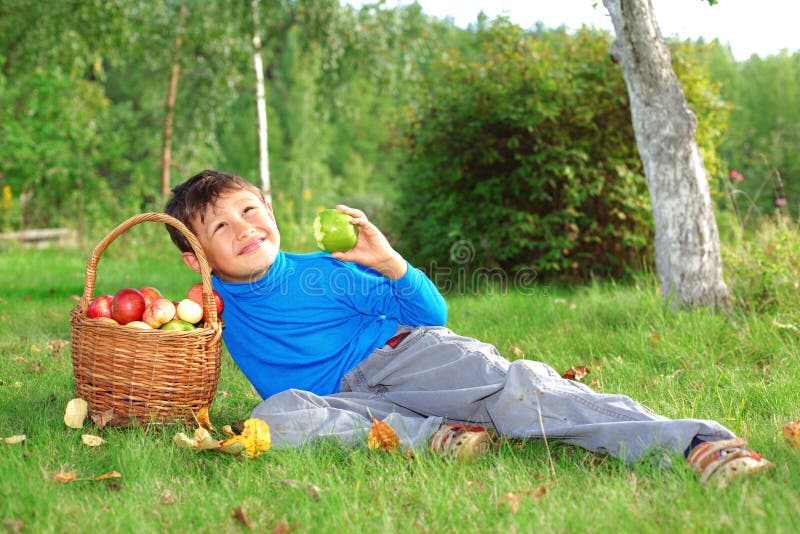 Dreaming kid posing outdoors