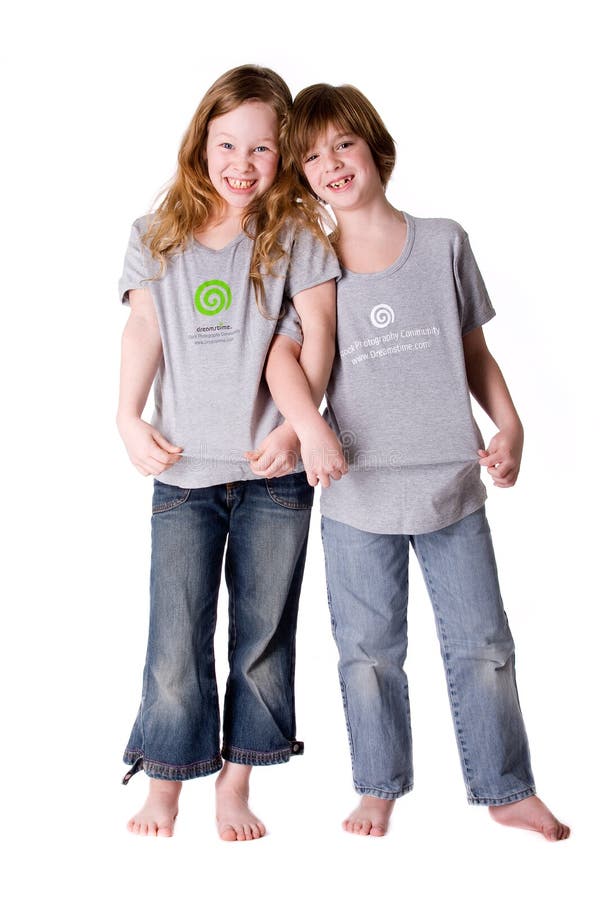 Boy and girl posing in a exclusive dreamstime shirt. Boy and girl posing in a exclusive dreamstime shirt