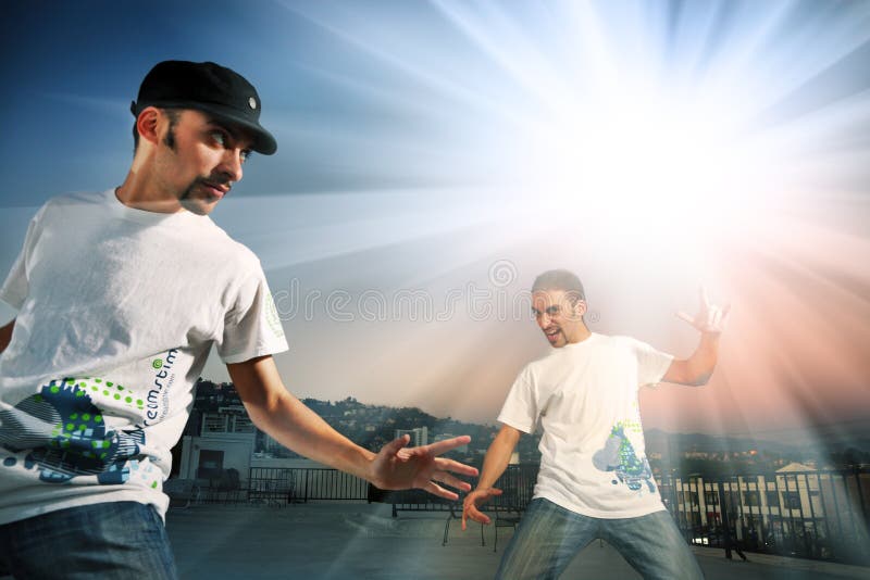 Two young men in Dreamstime t-shirts. Two young men in Dreamstime t-shirts.