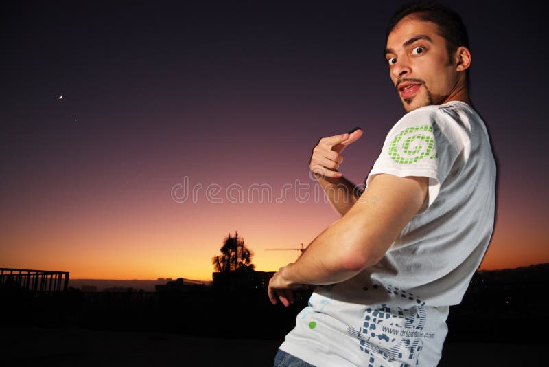 Young man in Dreamstime brand t-shirt. Young man in Dreamstime brand t-shirt