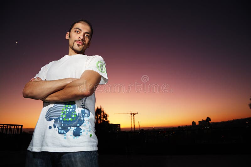 Young man in Dreamstime brand t-shirt. Young man in Dreamstime brand t-shirt