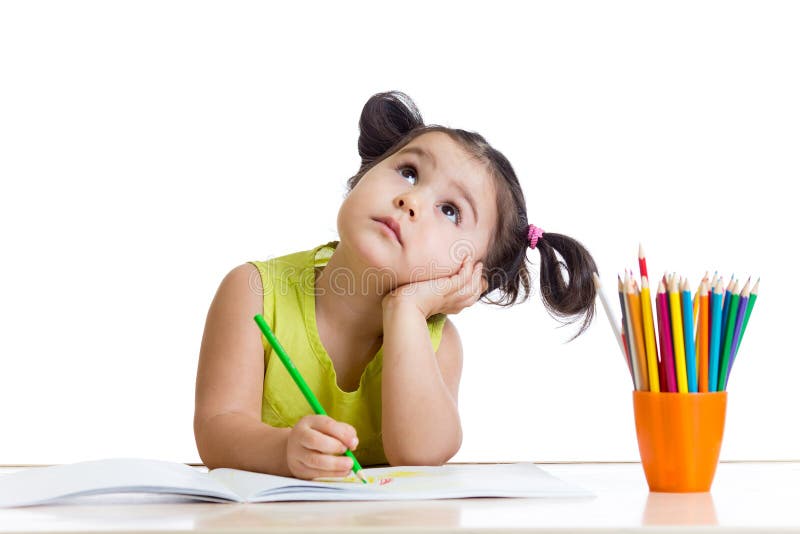 Dreamy child girl with pencils