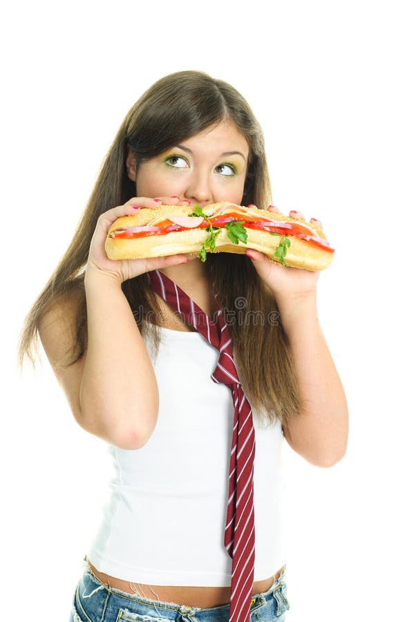 Dreamy girl eating a sandwitch