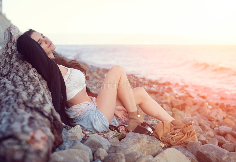 Brunette Hippie Woman, Wearing Boho Style Clothes, Squatting Down