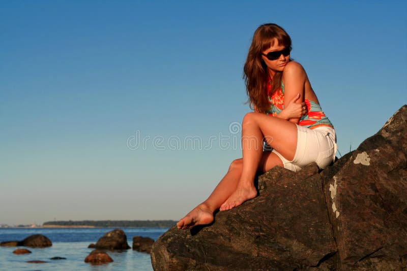 Dreamy woman in sunglasses stock images